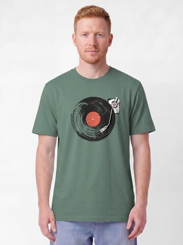 Watapparel T-Shirt 'Schallplatte' in Grün: Vorderseite