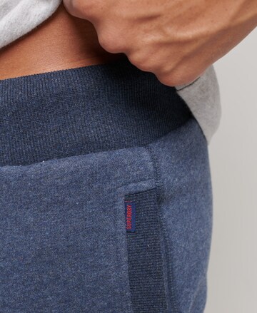 Superdry Tapered Broek in Blauw