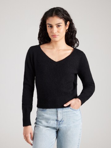 Pull-over Calvin Klein Jeans en noir : devant