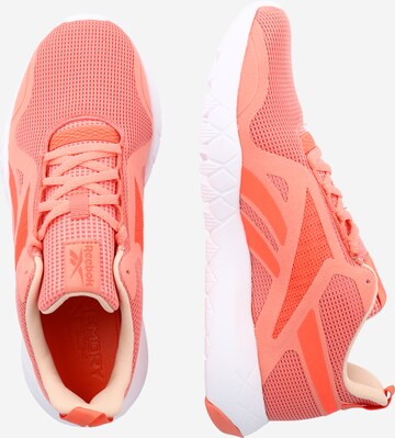 Reebok Juoksukengät 'Flexagon Force 3.0' värissä oranssi