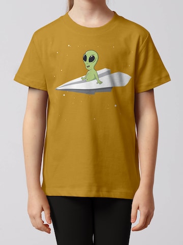 T-Shirt 'Alien on a Paper Plane' watabout.kids en jaune