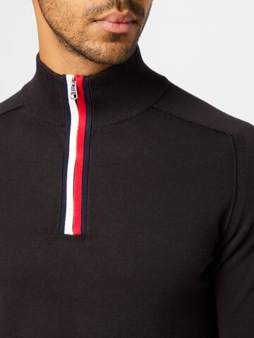 TOMMY HILFIGER Trui in Zwart