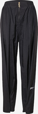 Loosefit Pantaloni sport de la Reebok pe negru: față