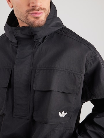 ADIDAS ORIGINALS Přechodná bunda 'BRITCORE' – černá