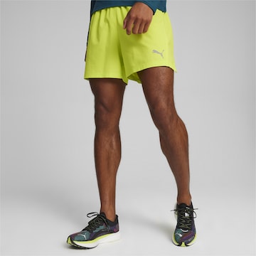 Regular Pantalon de sport PUMA en vert : devant