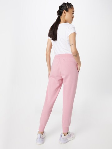 Tapered Pantaloni sportivi di 4F in rosa