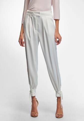 TALBOT RUNHOF X PETER HAHN Tapered Pants in White: front