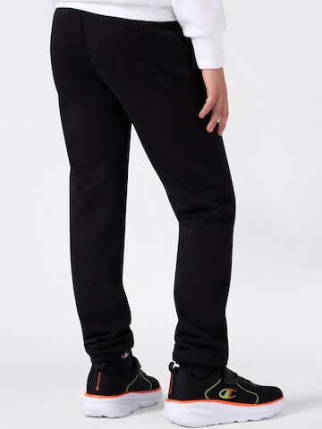Tapered Pantaloni di Champion Authentic Athletic Apparel in nero