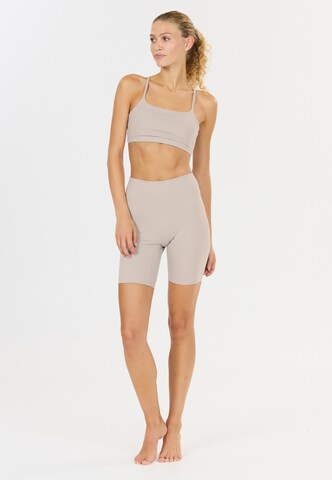 Athlecia Low Support Sport-BH 'Blossom' in Grau