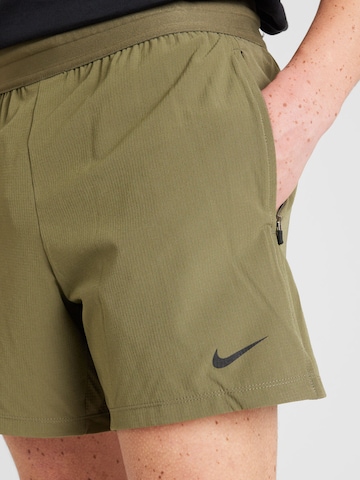 NIKEregular Sportske hlače 'FLX REP 4.0' - zelena boja