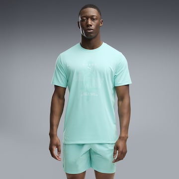 PUMA Функционална тениска в зелено: отпред