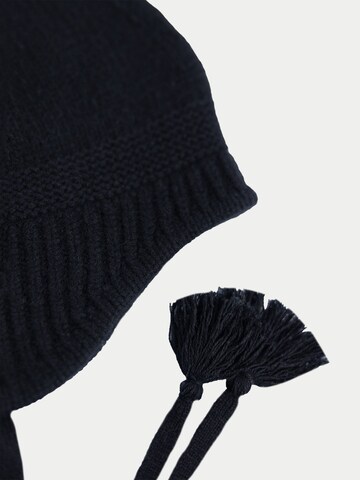 GOBI Cashmere - Sombrero 'Ultimate Warmth Knit Tie Hat' en negro