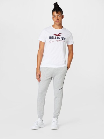 HOLLISTER Tapered Housut värissä harmaa