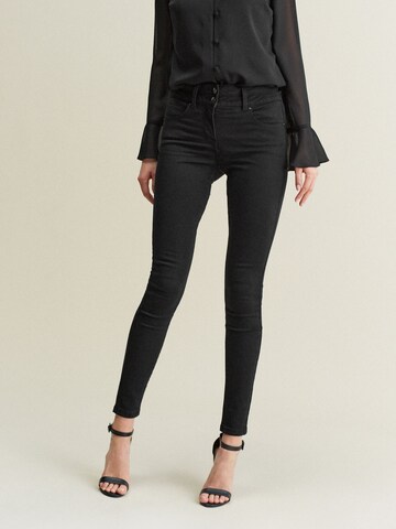 Skinny Jean Next en noir : devant