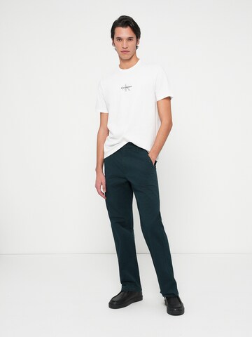 Calvin Klein Jeans Свободный крой Брюки-чинос '90S' в Синий