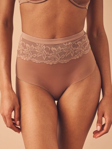 Next - Braga moldeadora en beige: frente