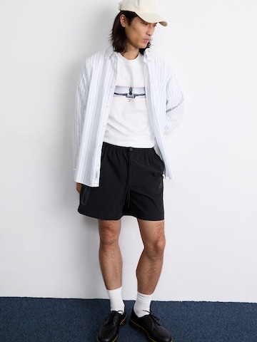 Nike Sportswear Loosefit Nadrág 'Tech' - fekete