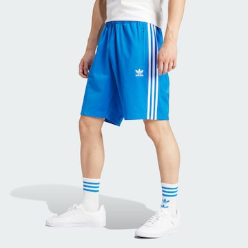 ADIDAS ORIGINALS Lużny krój Spodnie sportowe 'Adicolor' w kolorze niebieski