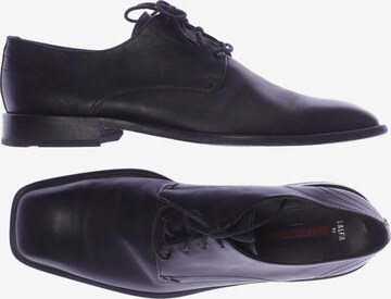 LLOYD Flats & Loafers in 47 in Black: front
