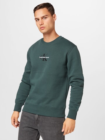 Calvin Klein Jeans Sweatshirt in Groen: voorkant