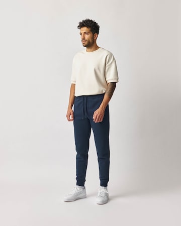 SNOCKS Tapered Sporthose in Blau