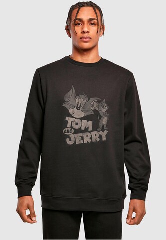 ABSOLUTE CULT Sweatshirt 'Tom And Jerry - Cartoon' in Zwart: voorkant