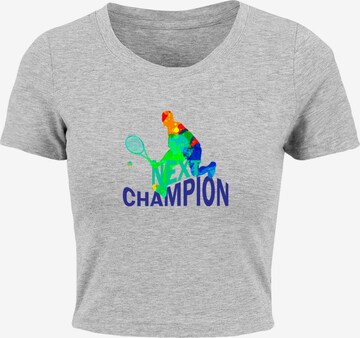 Merchcode T-Shirt 'Next Champion' in Grau: predná strana
