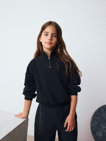 Next - Sweatshirt em preto: frente