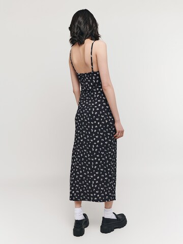 UNFOLLOWED x ABOUT YOU Dress 'EFFORTLESS' in Black: back