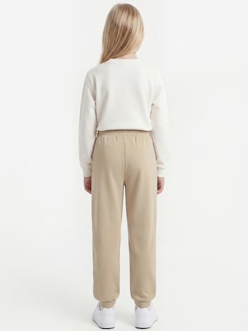 Effilé Pantalon ADIDAS ORIGINALS en beige