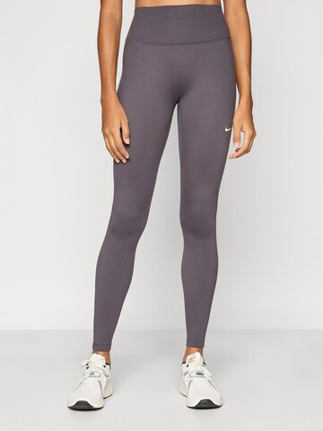 Skinny Pantalon de sport 'ONE' NIKE en gris : devant