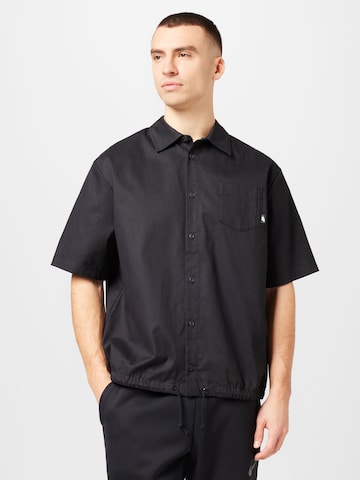 Nike Sportswear Comfort fit Button Up Shirt in Black: front