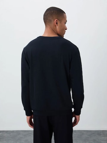 Sweat-shirt Tommy Life en noir
