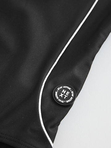 melns Next Peldkostīms