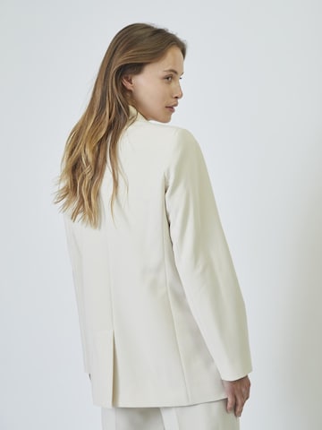 Blazer 'Vola' co'couture en blanc