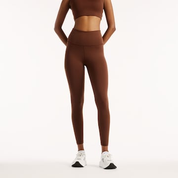 Skinny Pantaloni sportivi 'Define 25' di new balance in marrone: frontale