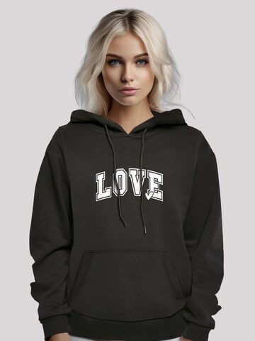 Sweat-shirt 'Love University Valentinstag Herz' F4NT4STIC en noir : devant