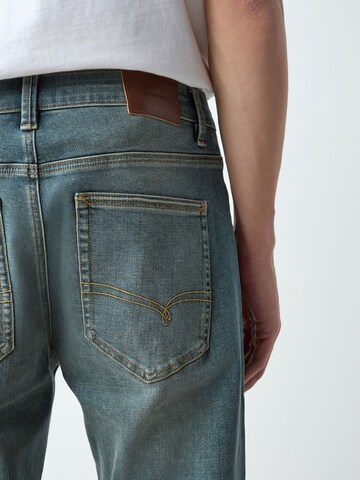 Effilé Jean 'Motionflex' Next en bleu