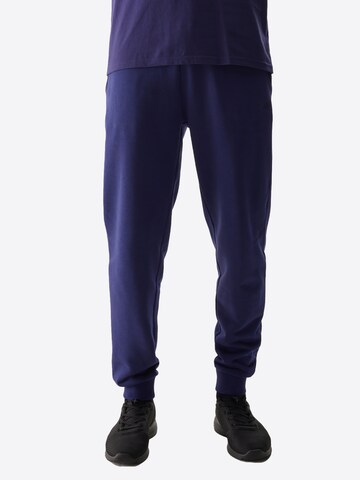 Tapered Pantaloni sport de la 4F pe albastru: față