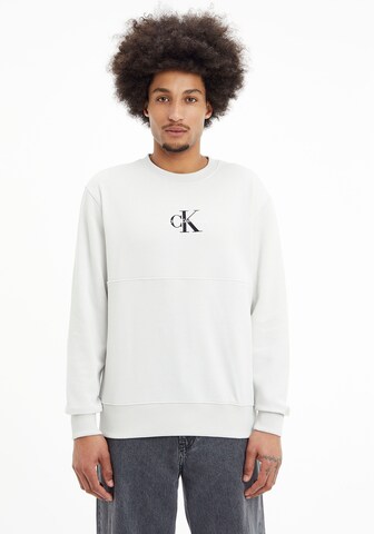 Sweat-shirt Calvin Klein Jeans en gris : devant