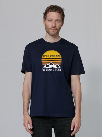 T-Shirt 'Mehr Wandern' Watapparel en bleu : devant