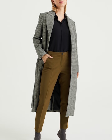 WE Fashion Конический (Tapered) Брюки-чинос в Зеленый