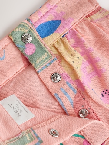 Next - Pijama entero/body en rosa