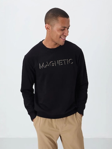 Sweat-shirt Tommy Life en noir : devant