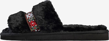 Mule 'London' Minnetonka en noir : devant