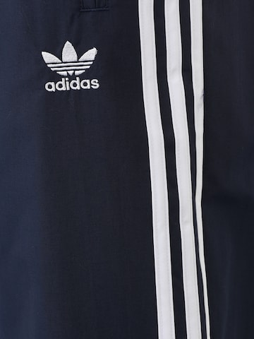 ADIDAS ORIGINALS Tapered Trousers in Blue
