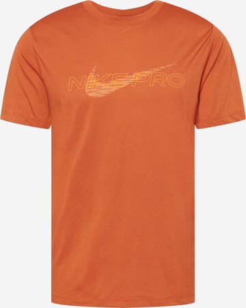 NIKE - Camiseta funcional 'Pro' en naranja: frente