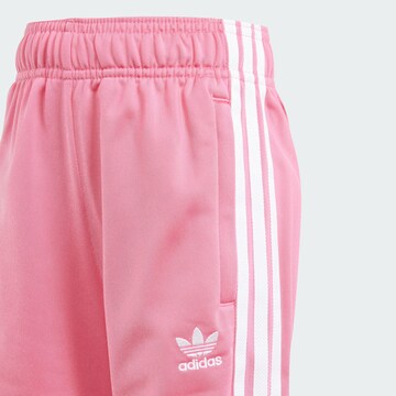 ADIDAS ORIGINALS Träningsoverall 'Adicolor Sst' i rosa