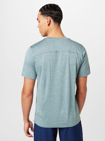 SKECHERS - Camiseta funcional en azul