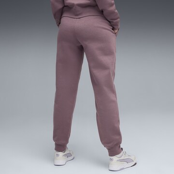 PUMA Tapered Sportbroek in Lila